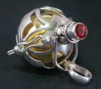 Harmony Ball, Heart Shapes in 925 Silver Cage, Red Quartz Gem