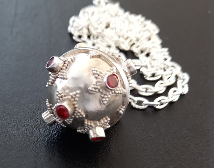 Harmony Ball Sterling Silver with Nine Ruby Quartz Gems - Click Image to Close
